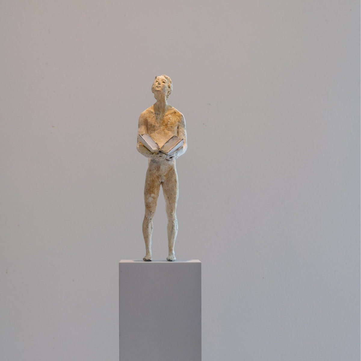 Bronze sculpture "Thoughts 6 - The Book" by Raffaella Benetti