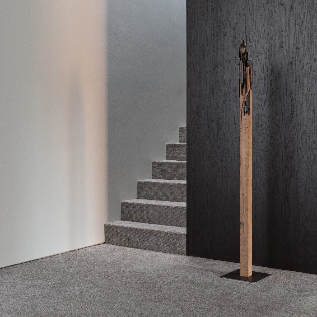 Bronze sculpture "In Tribus" by Guy Buseyne