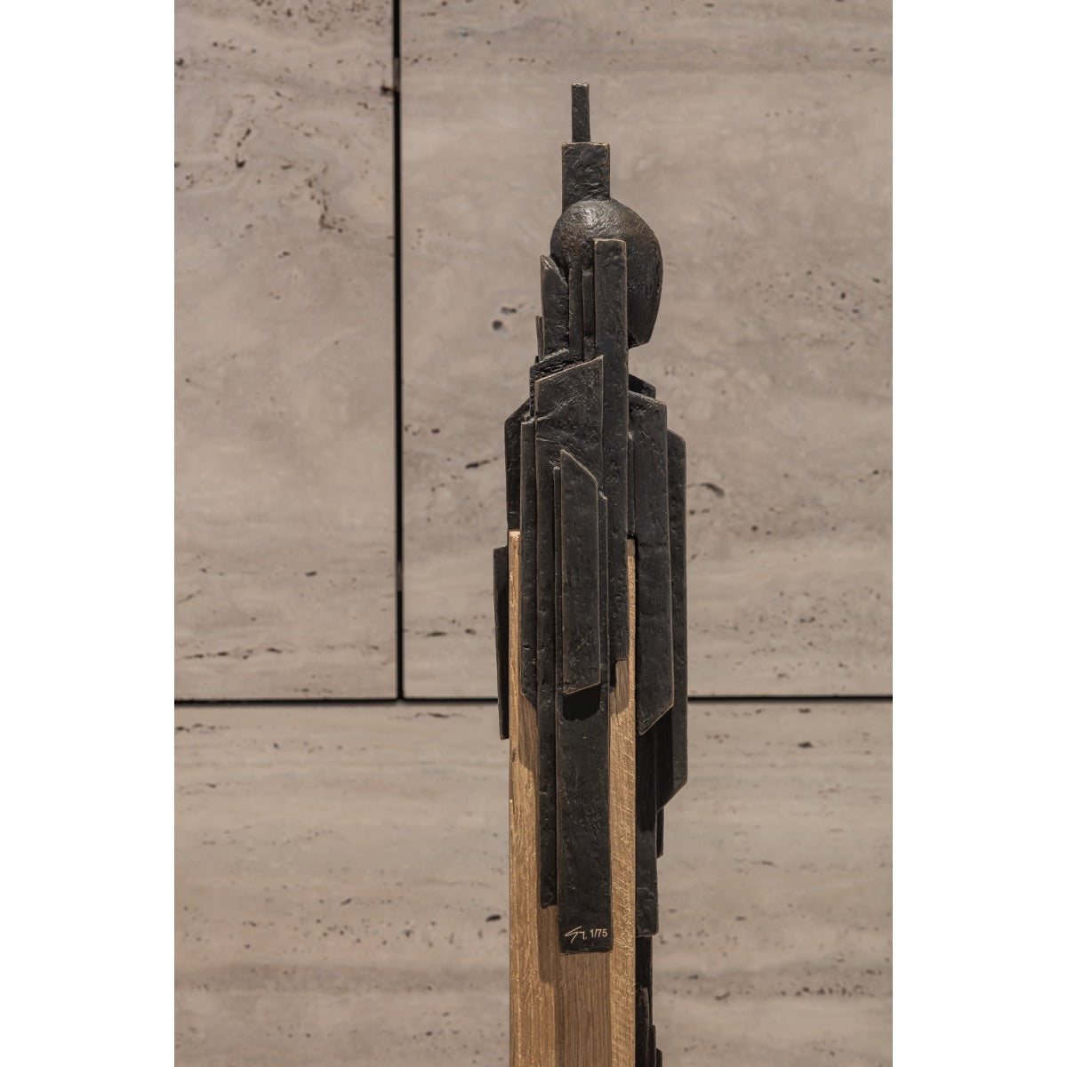 Bronze sculpture "In Tribus" by Guy Buseyne