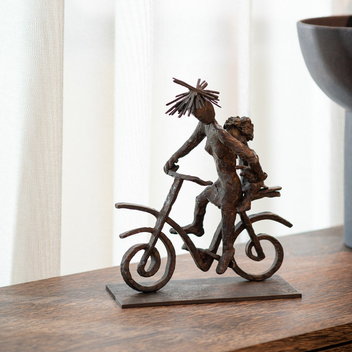 Bronze sculpture "Carefree" by Freddy De Waele