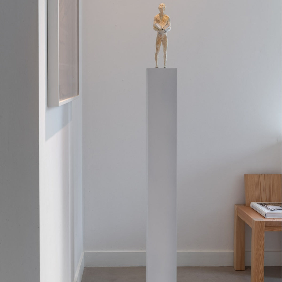 Bronze sculpture "Thoughts 6 - The Book" by Raffaella Benetti