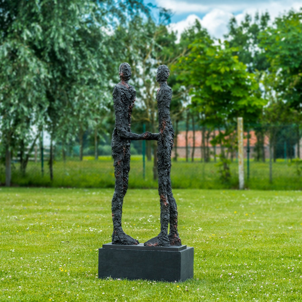 Bronze sculpture "To Greet" by Ann Vrielinck