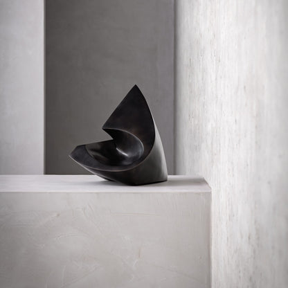 Bronze sculpture "Hollow sphere" by Kris Demuelenaere